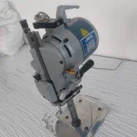 دکمه زن و قیچی و سردوز