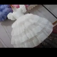 لباس عروس مجلسی دخترانه شاین هفت‌رنگ استین پفی