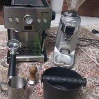 قهوه سازکامل  و آسیاب کن در حد نو به علت مهاجرت