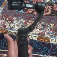گیمبال موبایل همراه با سه پایه کوچک کارتون