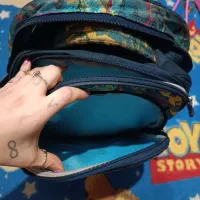 کوله پشتی چراغ دار مدرسه|کیف، کفش، کمربند|رشت, کوی قدس|دیوار