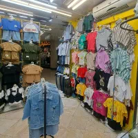 فروشنده پوشاک بچگانه دربازار فردوسی