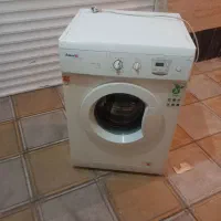 لباس شویی  اصل اسپانیا مونتاژ ایران کم کارکرد