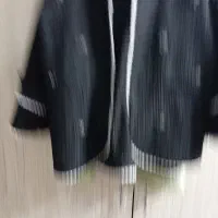 چند عدد مانتو و لباس مجلسی در حد نو