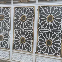 درب سه لنگه آماده با طرح اسلیمی رنگ شده با حفاظ