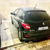 پژو۲۰۷ مشکی سقف پانا ارتقا اتومات مدل ۱۴۰۳