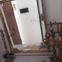 آینه‌وشمدان جنسش برونز رنگ طلایی