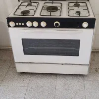 اجاق گاز و مبل هفت نفره