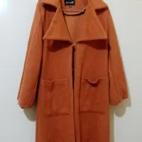 پالتووکاپشن|لباس|اقلید, |دیوار