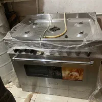 اجاق گاز فر دار پنج شعله مارک اسنوا|اجاق گاز و لوازم برقی پختوپز|تهران, جوادیه|دیوار