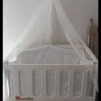 گهواره کنار تخت مادر