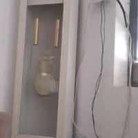 زیر تلوزیون و ساعت ست
