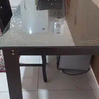 میز بزرگ با سه عدد صندلی