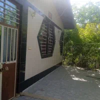 فروش خانه ویلایی با باغ جلوی آن ویلا باغ