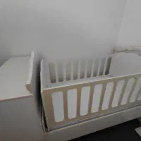 تخت گهواره کنار تخت مادر
