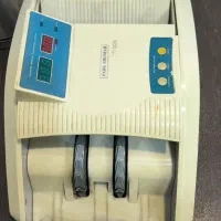 دستگاه پول‌شمار + دستگاه تشخیص پول تقلبی