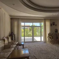 فروش آپارتمان صفرحیاط دار ۲خوابه  پارکینگ اختصاصی