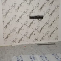 نصاب کاغذ دیواری