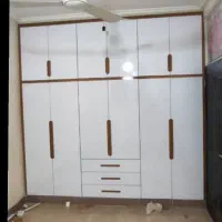 ساخت انواع کمد دیواری با جنس پاک چوب جم