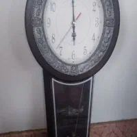 ساعت دیواری آونگ دار