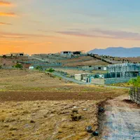 450مترزمین چهاردیواری/قابل ساخت/همراه با آب و برق|فروش زمین و ملک کلنگی|هشتگرد, کوشک زر|دیوار