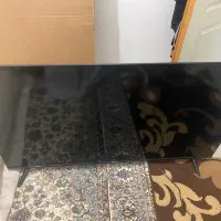 تلویزیون ۵۵ اینچ ضربه خورده