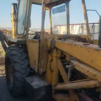 بیل بکهو مدل بسیار تمیز|خودرو سنگین|میانه, |دیوار