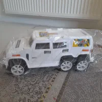 تعدادی لباس بچگانه اسباب بازی