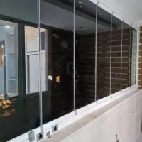 بالکن شیشه ای ریلی تاشو