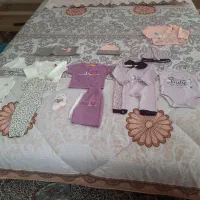 تعدای لباس نوزاد