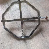 شعله دمکن گازی  روی دیگ استیل اجاق دمی دمکش سردیگ