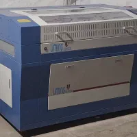 دستگاه برش و حکاکی لیزر 60در90 (یومینگ میز برقی)