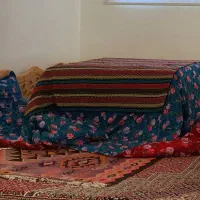 کرسی بزرگ  با لحاف و بالشت ها و...