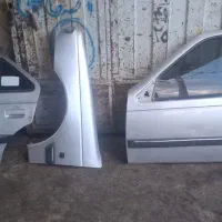 درب سمت راننده پژو نقره ای