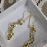 گوشواره و شمش و سکه