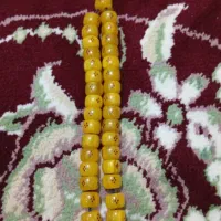 تسبیح سندلوس 33 عددی کهربا