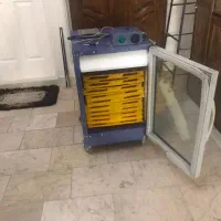 یک دستگاه میوه وسبزی خشک کن،همراه رطوبت سنج