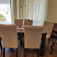 میز ناهار خوری ۸ نفره با صندلیها