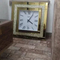 ساعت دیواری طلا کوب مارک سی تی زن