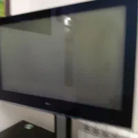 تلویزیون LG همراه میز تلویزیون شیشه ای|تلویزیون و پروژکتور|تهران, جنتآباد جنوبی|دیوار