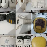 لوازم مبارزه ساق بند کلاه روپایی و دو دست لباس