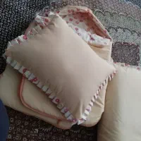 تشک و بالشت نوزاد تازه دوخته شده