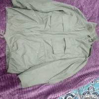 کاپشن نو|لباس|قم, باغ شریفی|دیوار