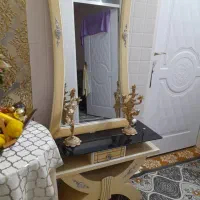 اینه کنسول با شمعدانیها