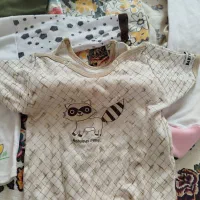 تعداد زیادی لباس نوزادی