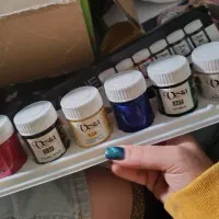 گواش. کفش.عروسک.رژ