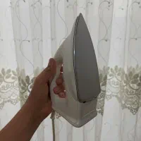 اتو لباس و دکمه