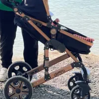 کالسکه و تخت کنار مادر سیسمونی در حد نو|تخت و صندلی بچه|چالوس, |دیوار