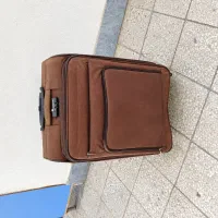 چمدان مسافرتی  رنگ قهوه‌ای