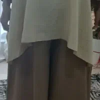 مانتو وشلوار دم پا گشاد نو میباشد.